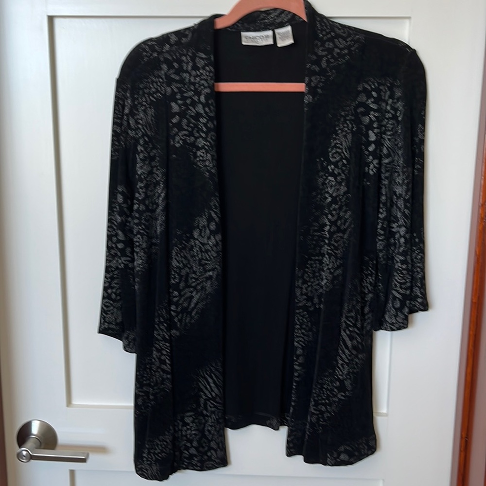 Beautiful Chico’s Travelers black and silver jacket. Size 1